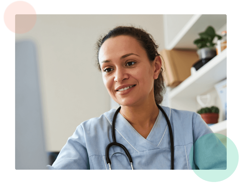 nurse looking at computer